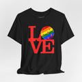Rainbow LOVE Pickleball Pride T-shirt featuring colorful LGBTQ2 design on a comfortable cotton tee.
