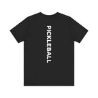 Men's Retro Pickleball Action T-Shirt with dynamic front silhouette and vertical 'PICKLEBALL' text on the back by Printify.