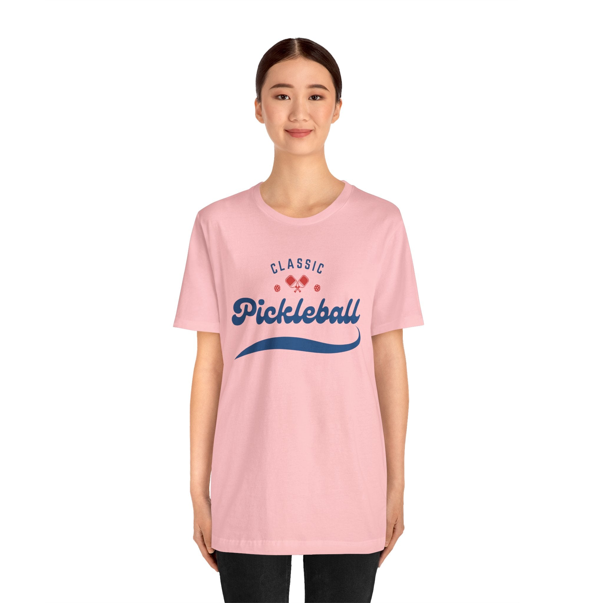 Red and blue pickleball T-shirt featuring paddle and ball design, classic script print, by Printify.