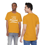 Classic pickleball T-shirt with "Pickleball" script design by Printify, featuring a casual fit and vibrant print on soft fabric.