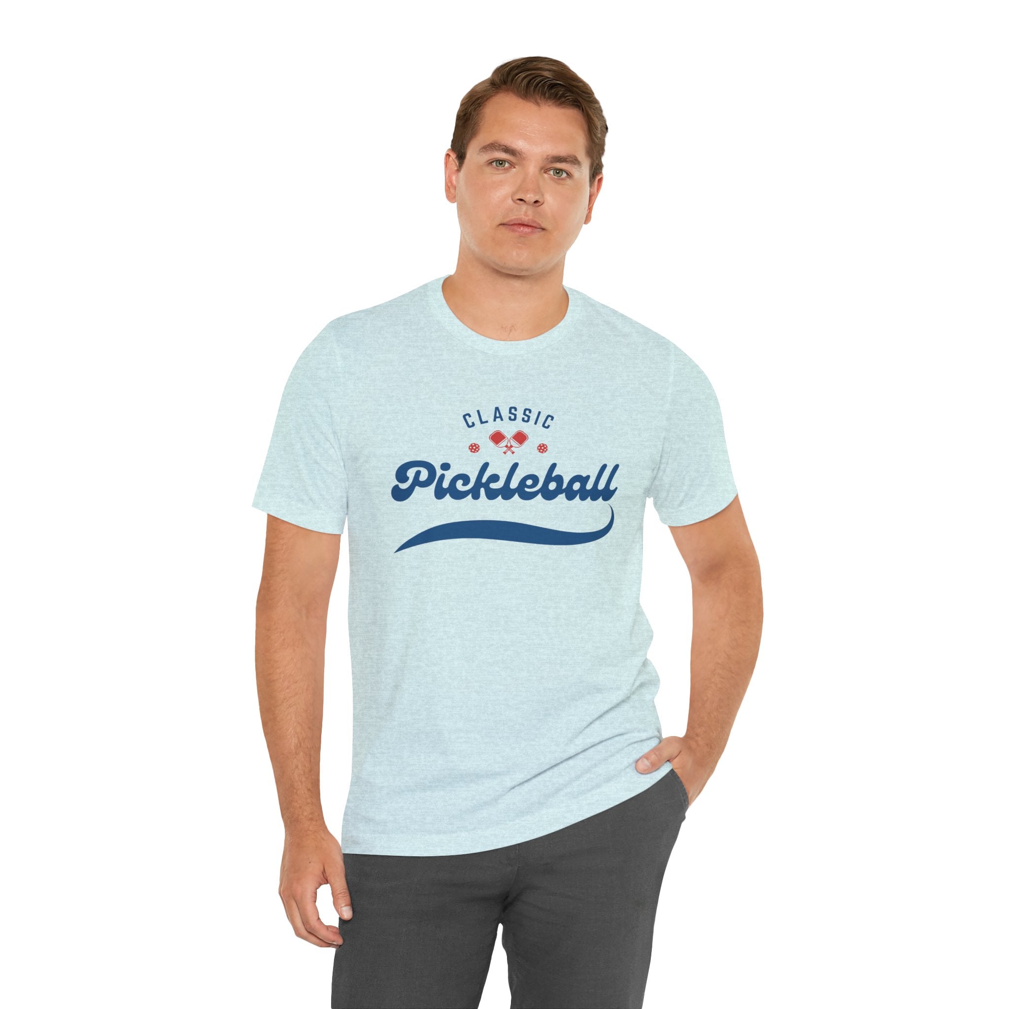 Red and blue pickleball script tee featuring paddle and ball design, casual cotton T-shirt by Printify.