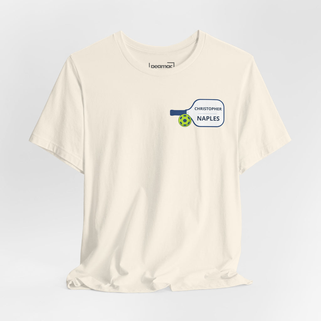 Custom pickleball T-shirt with paddle graphic, personalized with name and club, by Printify.