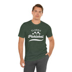 Classic pickleball T-shirt with "Pickleball" script design, comfortable cotton fabric, perfect for pickleball players and enthusiasts.