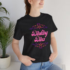 Pink Dinking Diva pickleball T-shirt with filigree design, athletic fit, and printed logo on front.