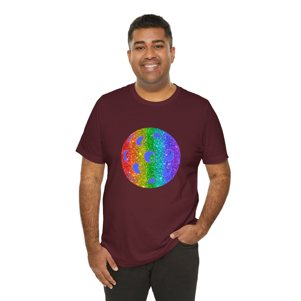 Rainbow glitter pickleball pride T-shirt featuring bold "Loud and Proud" text, designed by Printify for celebrating LGBTQ+ pride.