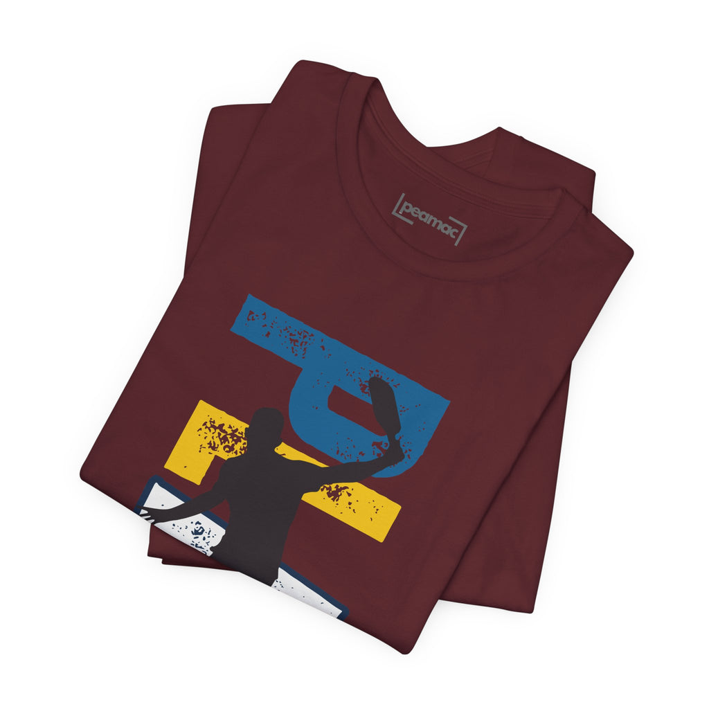 Men's Retro Pickleball Action T-Shirt with dynamic front silhouette and vertical "PICKLEBALL" text on the back.