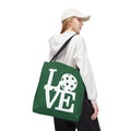 Green Pickleball LOVE tote bag by Printify, spacious sporty design with durable fabric for carrying sports gear and everyday essentials.