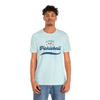 Red and blue pickleball paddle and ball design on a classic script tee shirt, featuring a comfortable cotton fit.