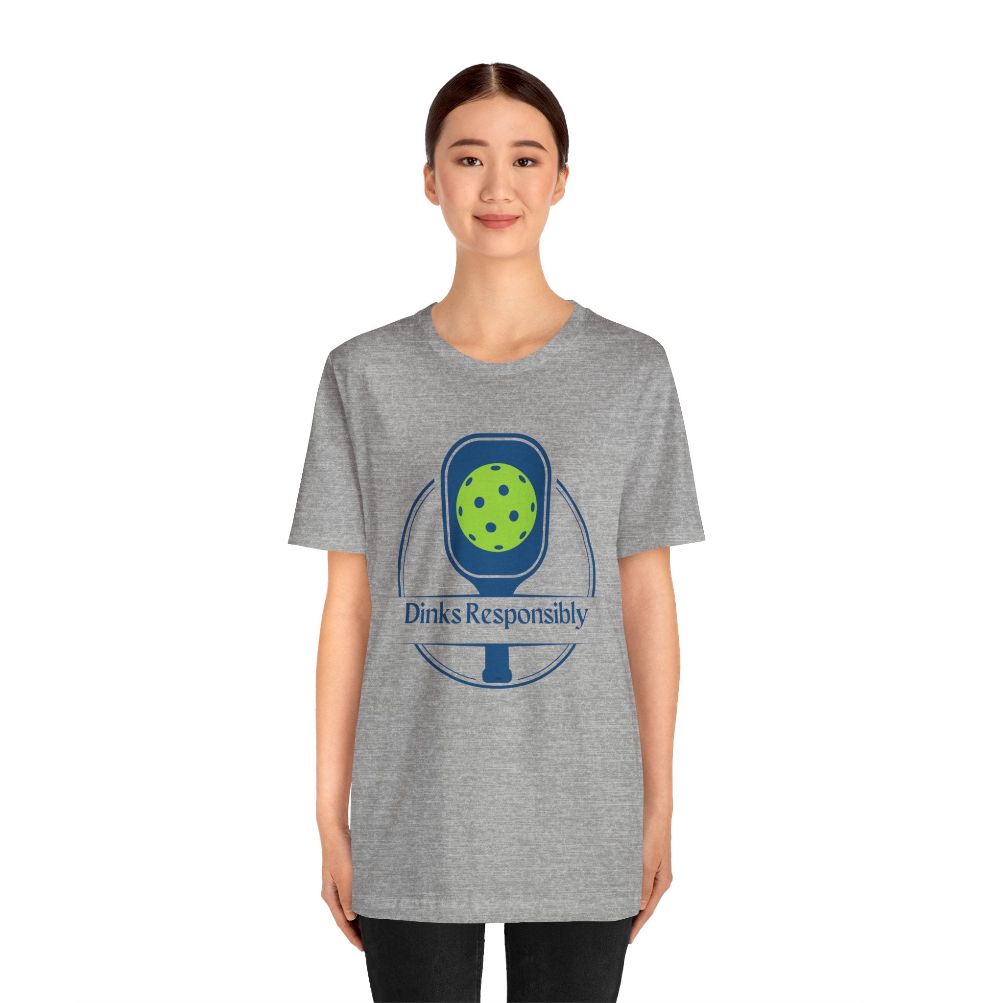 Dinks Responsibly pickleball T-shirt featuring a paddle and ball graphic, perfect for pickleball enthusiasts.