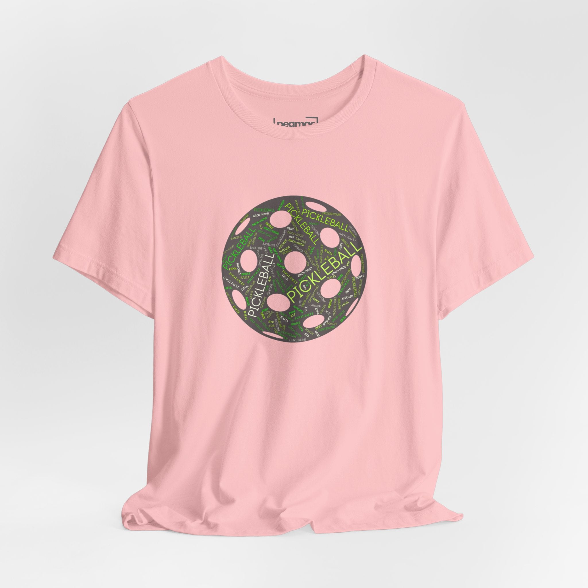 Pickleball Word Cloud T-shirt with pickleball-shaped graphic featuring words like dink, pickle, and kitchen printed on the shirt.