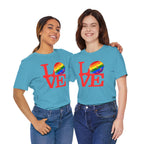 Rainbow LGBTQ2 Pride T-shirt featuring the LOVE Pickleball logo, colorful design, and casual fit by Printify.