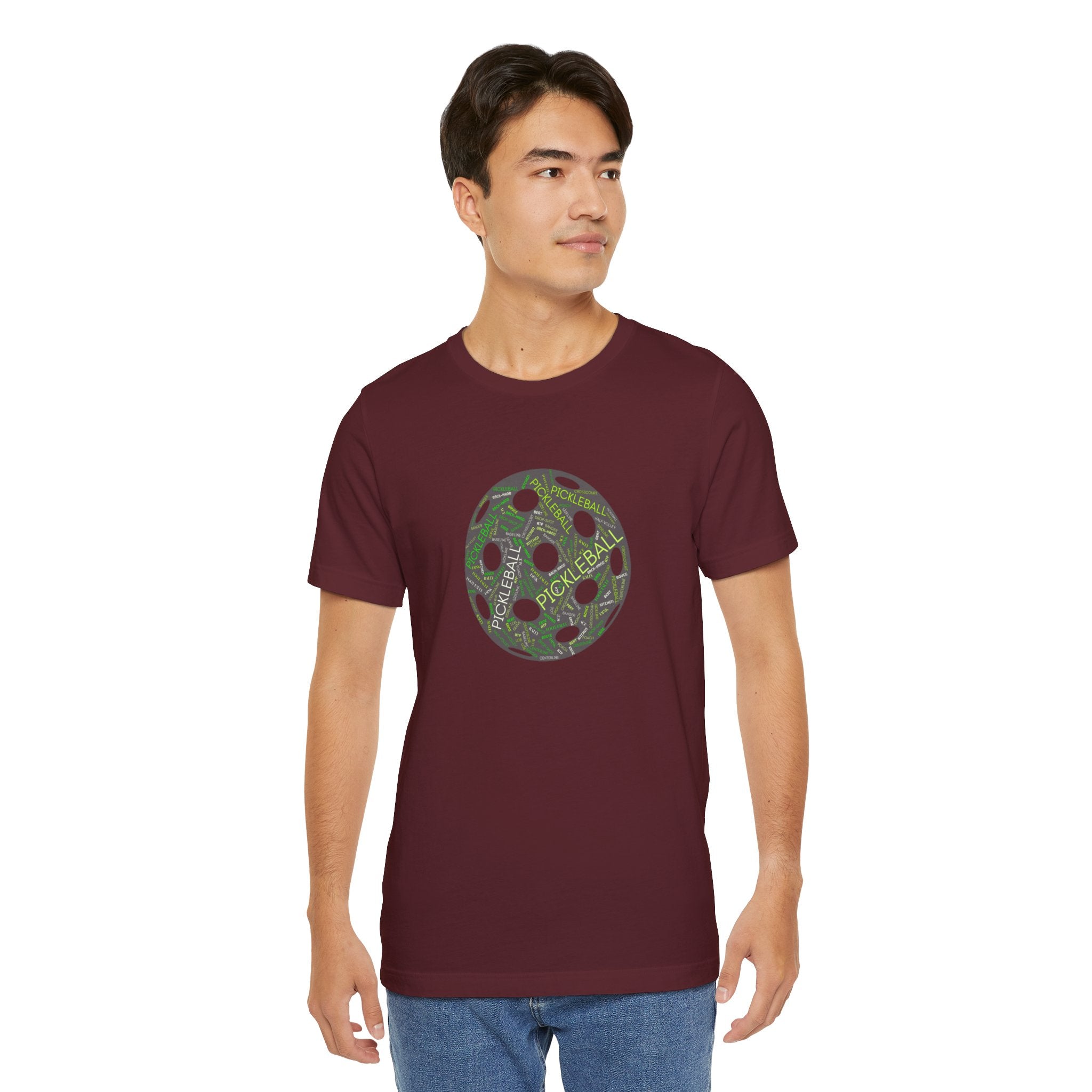Printify pickleball word cloud T-shirt featuring a pickleball-shaped graphic with words like dink, pickler, and kitchen.