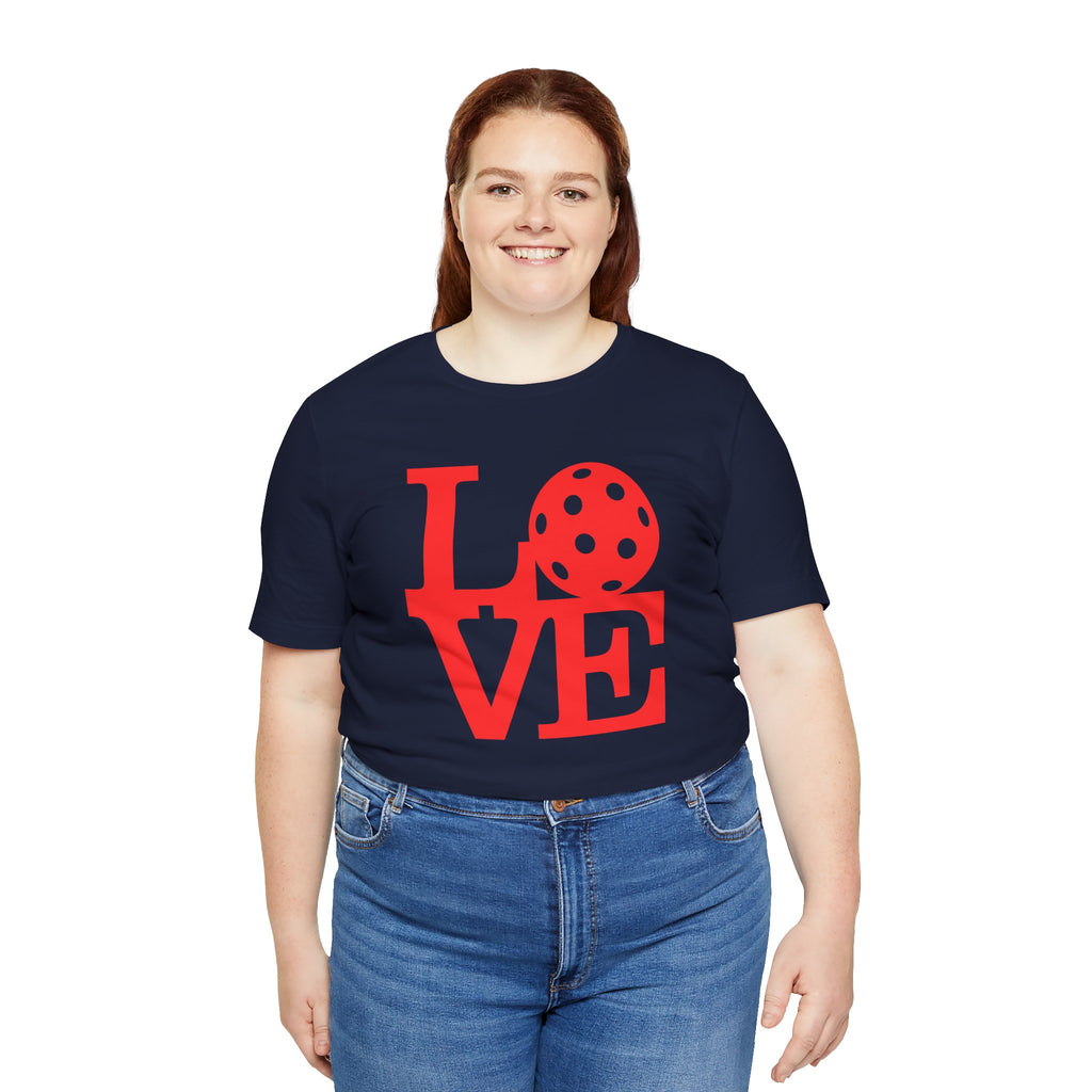 Red love pickleball graphic T-shirt by Printify featuring bold pop art design, casual short-sleeve shirt for activewear or everyday wear.