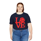 Red love pickleball graphic T-shirt by Printify featuring bold pop art design, casual short-sleeve shirt for activewear or everyday wear.