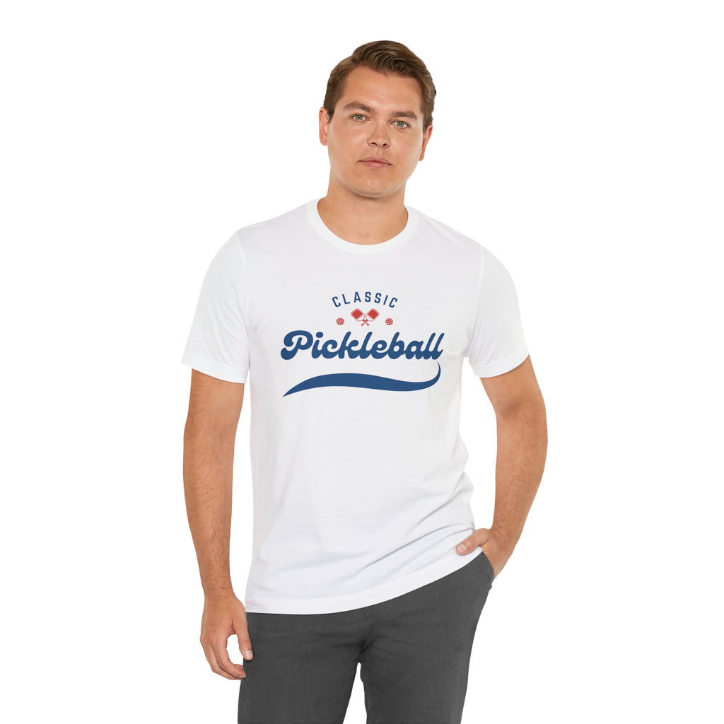 Red and blue pickleball paddle and ball graphic on a classic script tee shirt, ideal for pickleball enthusiasts.