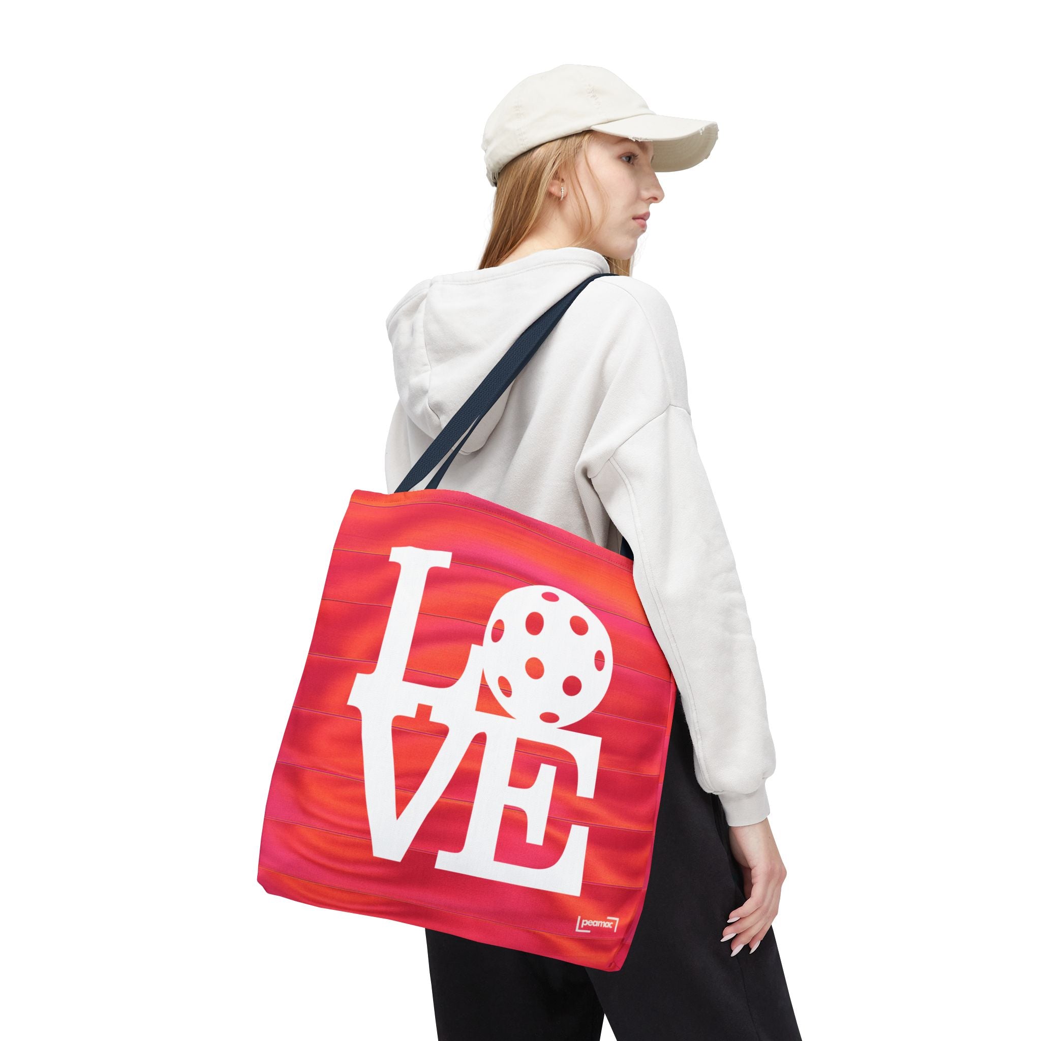 Large sporty tote bag in orange and pink with pickleball design, ideal for carrying sports gear and accessories.