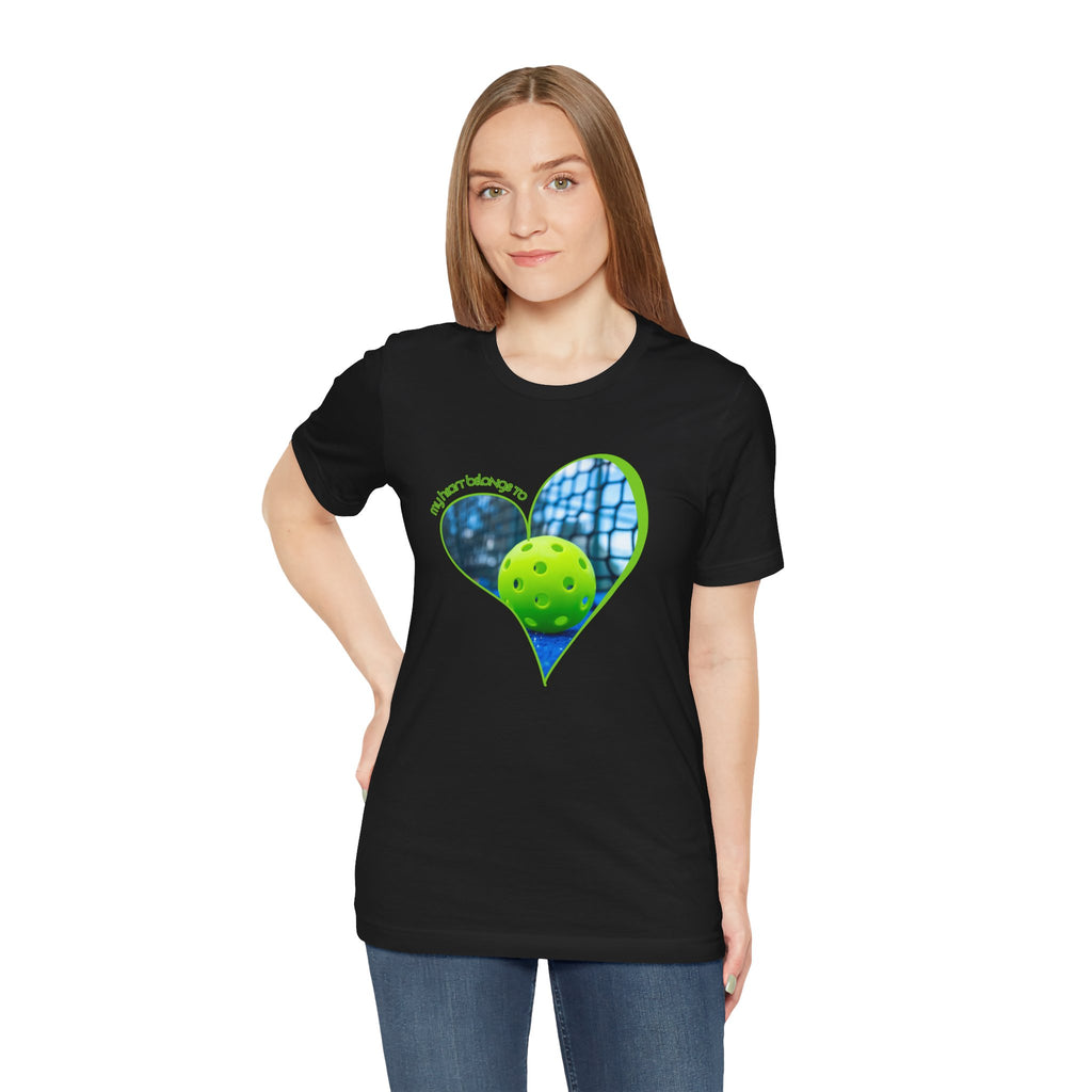 White pickleball T-shirt with "My Heart Belongs to Pickleball" print, designed for players and fans, by Printify.