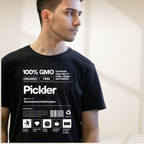 Close-up of white Pickler Funny Definitions T-Shirt by PeaMac Pickleball Tees, featuring humorous pickleball-themed text on a tri-blend fabric.