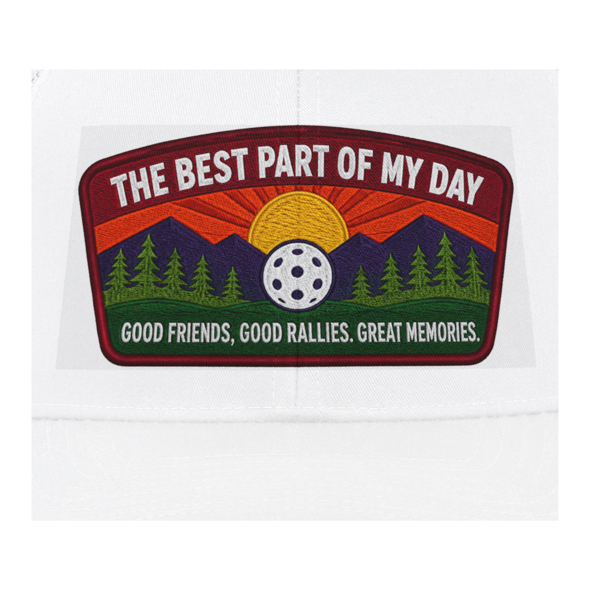 An embroidered patch with a mountain and sunset design, featuring the text 'THE BEST PART OF MY DAY' at the top and 'GOOD FRIENDS, GOOD RALLIES, GREAT MEMORIES.' at the bottom, shown on a white fabric background.