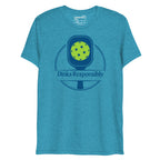 Unisex aqua tri-blend pickleball T-shirt featuring a paddle and ball graphic with humorous "Dinks Responsibly" slogan.