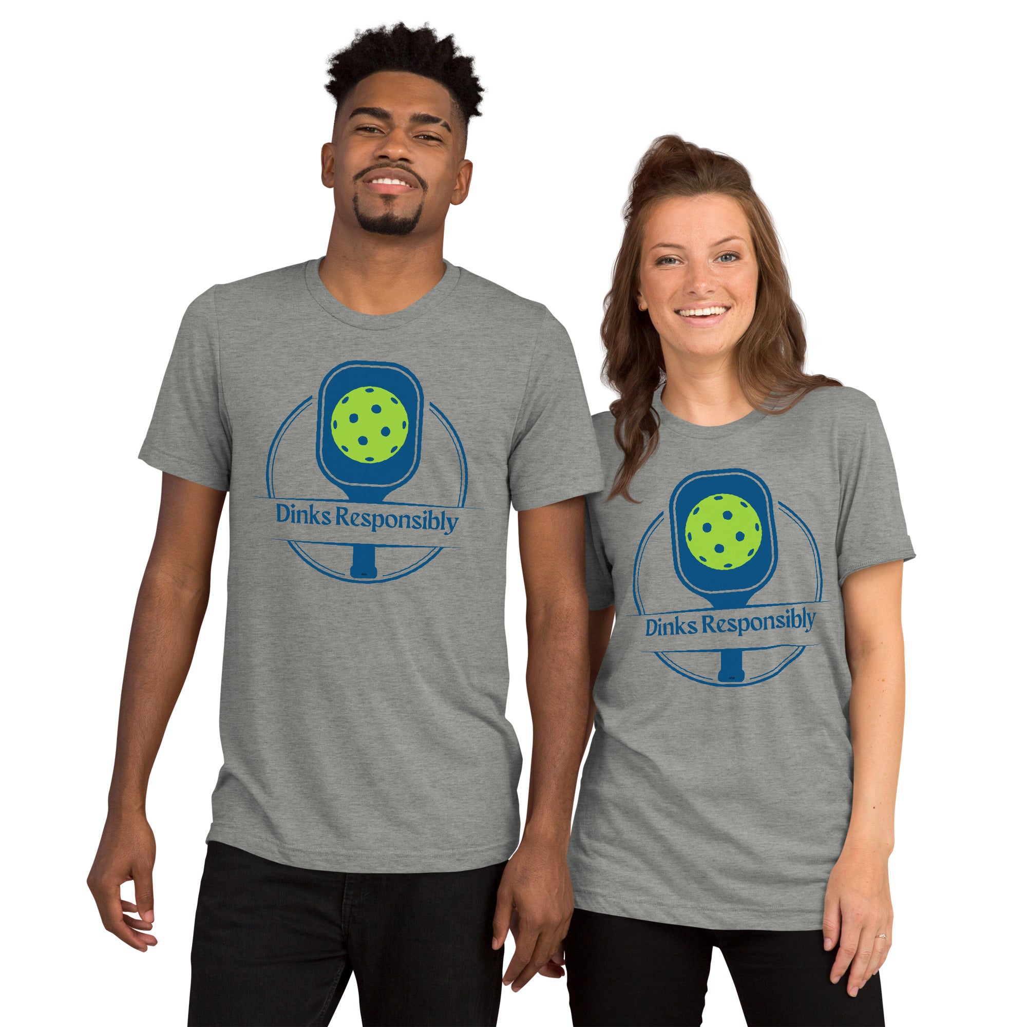 Unisex athletic grey tri-blend T-shirt with a pickleball paddle and ball graphic, featuring humorous "Dinks Responsibly" slogan.