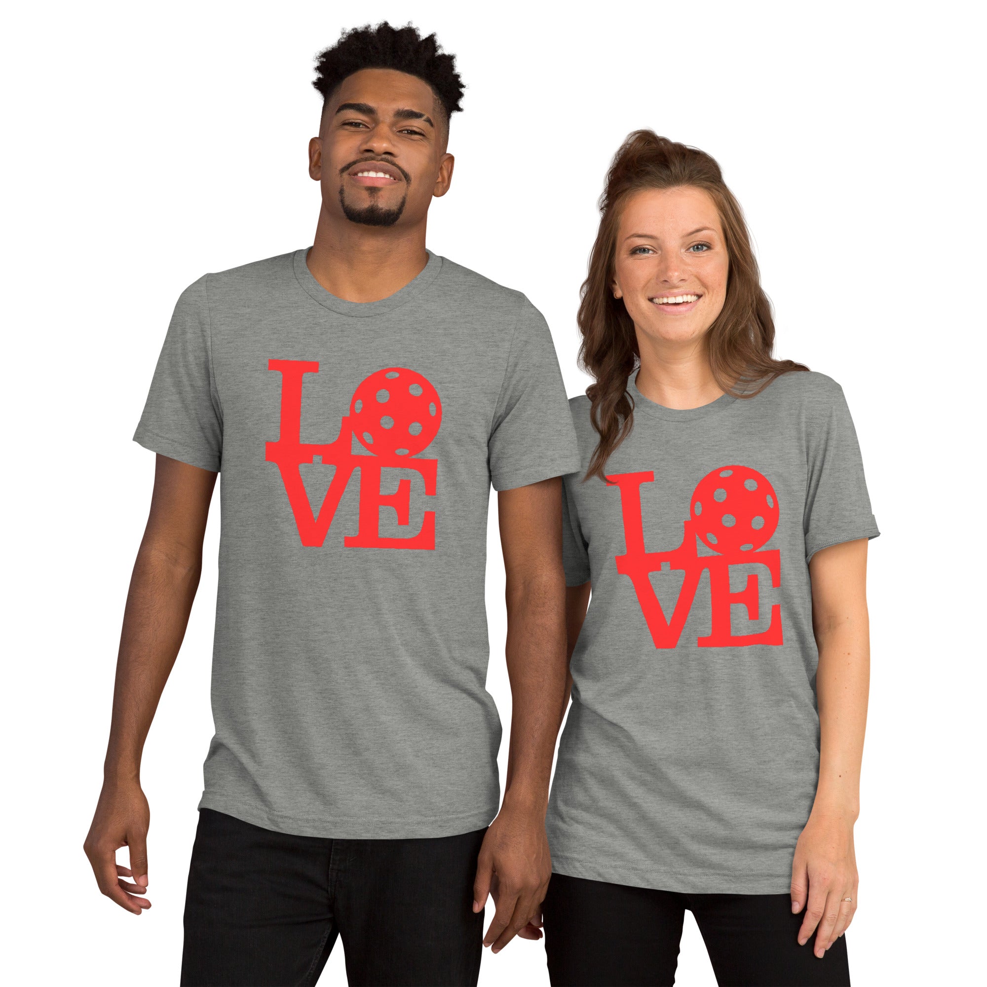 Unisex grey tri-blend T-shirt with bold red pickleball pop art graphic by PeaMac Pickleball Tees.
