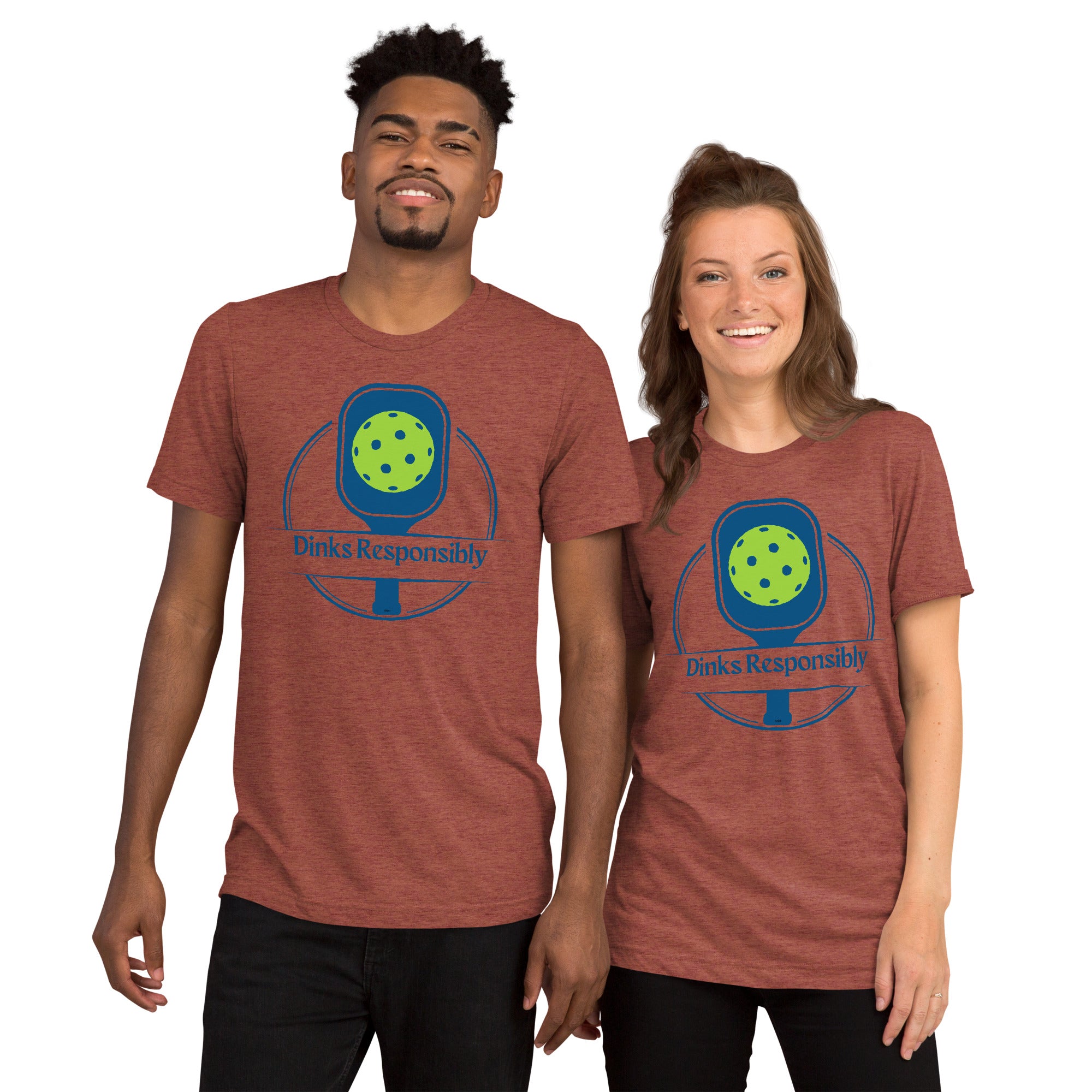 Unisex Dinks Responsibly Pickleball T-Shirt by PeaMac Pickleball Tees featuring a paddle and ball graphic on a clay-colored tri-blend fabric.