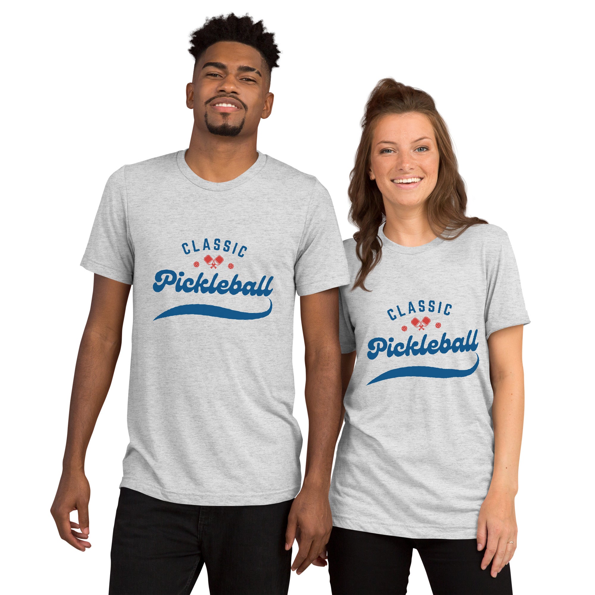 Unisex white tri-blend T-shirt featuring a red and blue pickleball paddle and ball design for PeaMac Pickleball Tees.