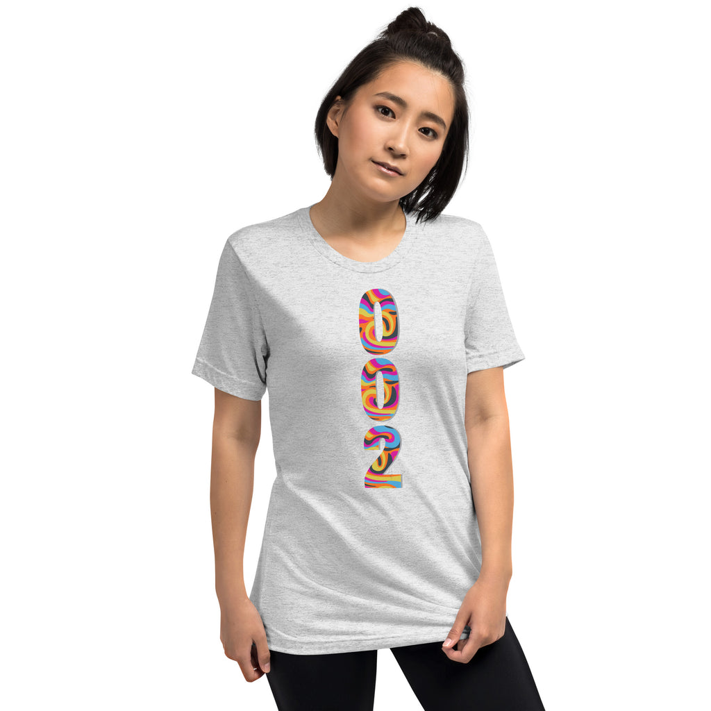 Unisex white tri-blend pickleball T-shirt with psychedelic design by PeaMac Pickleball Tees, front view showing vibrant print.