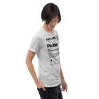 White unisex Pickler Funny Definitions T-shirt by PeaMac Pickleball Tees, featuring a tri-blend fabric and playful pickleball graphic.