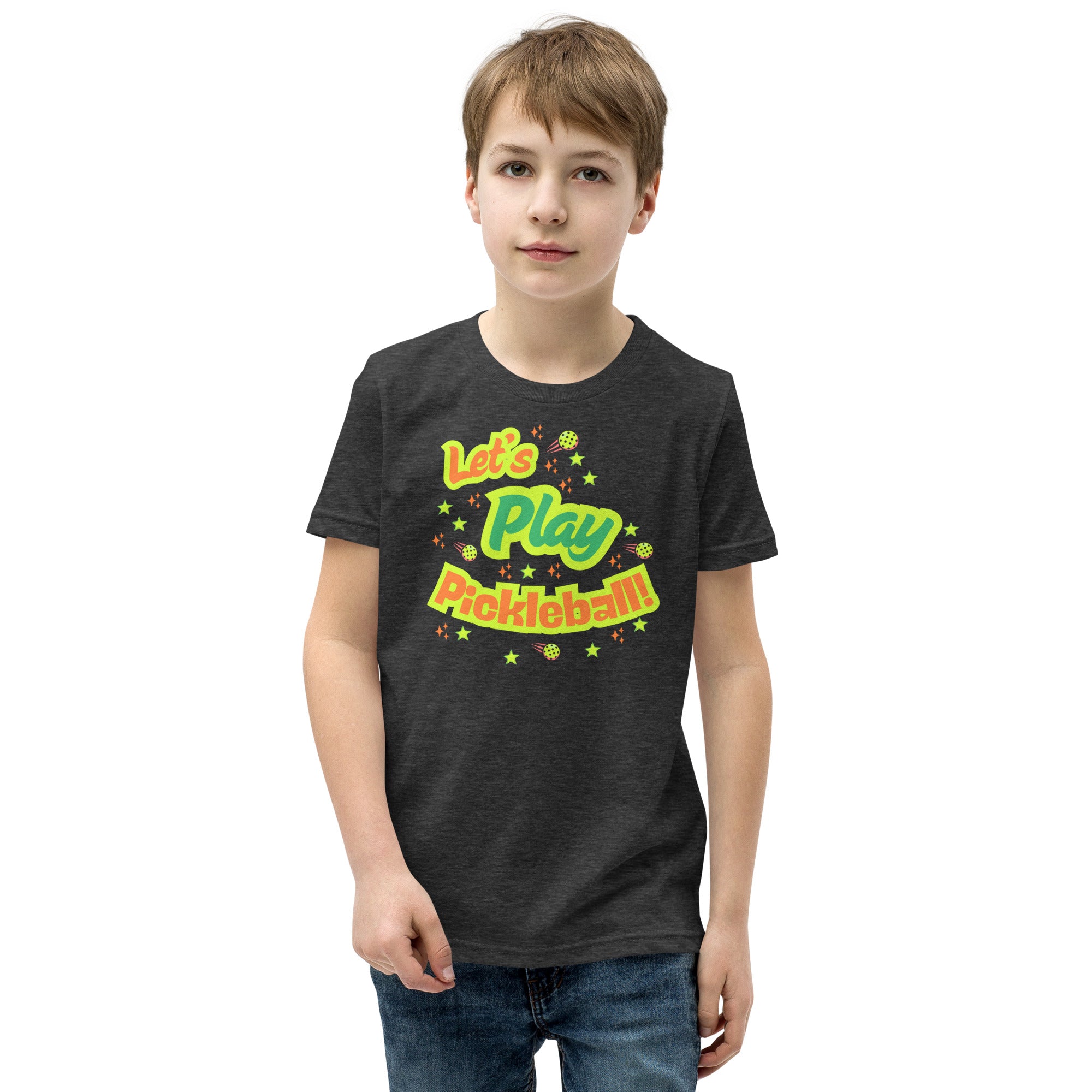 Dark grey Heather youth T-shirt by PeaMac Pickleball Tees with neon pickleball graphic and "Let's Play Pickleball!" text for kids.